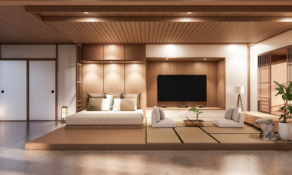 Minimalist Japanese-inspired suite featuring soft ambient hotel lighting design for a tranquil guest experience.